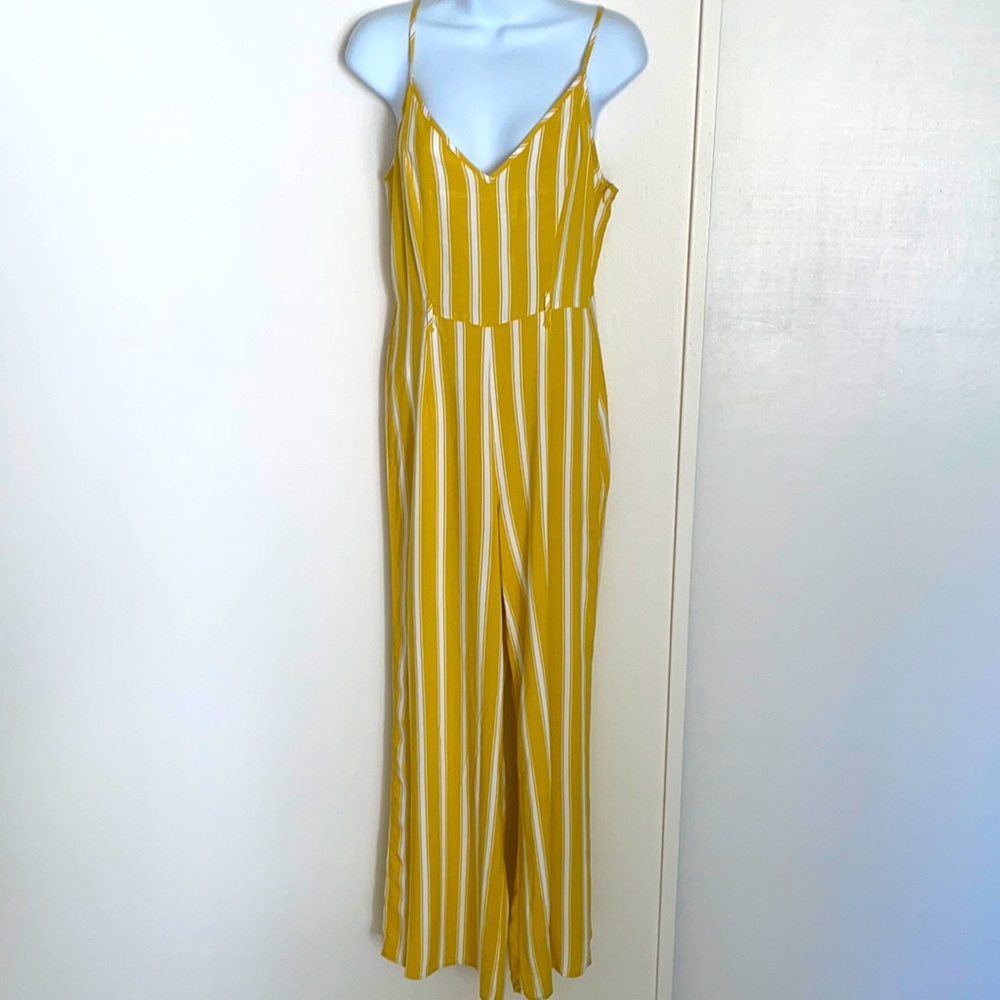 Novia yellow stripped flare off shoulder jumpsuit